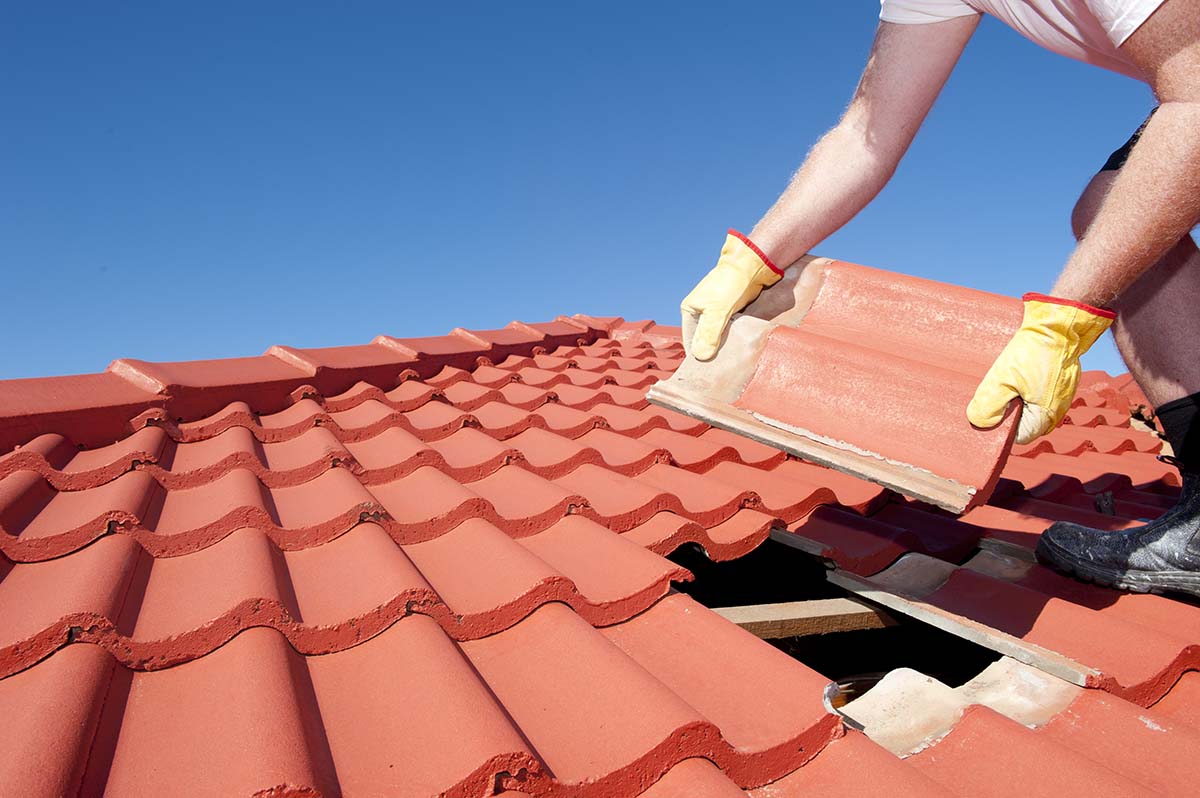 An EC Roofing crew carrying out work on a Maryland home